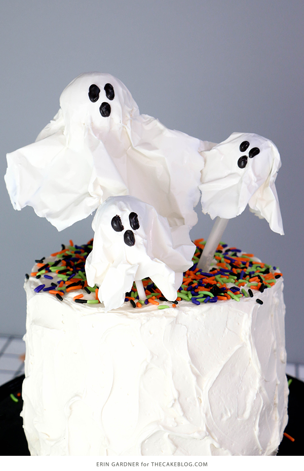 Chocolate Lollipop Ghosts - how to make edible lollipop ghosts for Halloween cakes and cupcakes using white chocolate and suckers | by Erin Gardner for TheCakeBlog.com