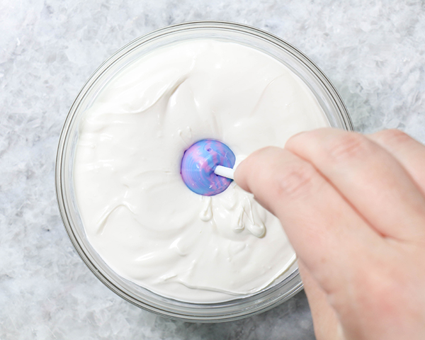 Chocolate Lollipop Ghosts - how to make edible lollipop ghosts for Halloween cakes and cupcakes using white chocolate and suckers | by Erin Gardner for TheCakeBlog.com