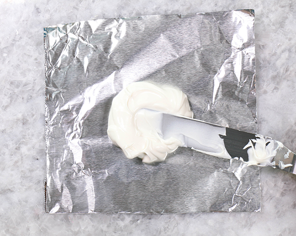 Chocolate Lollipop Ghosts - how to make edible lollipop ghosts for Halloween cakes and cupcakes using white chocolate and suckers | by Erin Gardner for TheCakeBlog.com