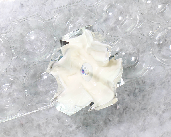 Chocolate Lollipop Ghosts - how to make edible lollipop ghosts for Halloween cakes and cupcakes using white chocolate and suckers | by Erin Gardner for TheCakeBlog.com