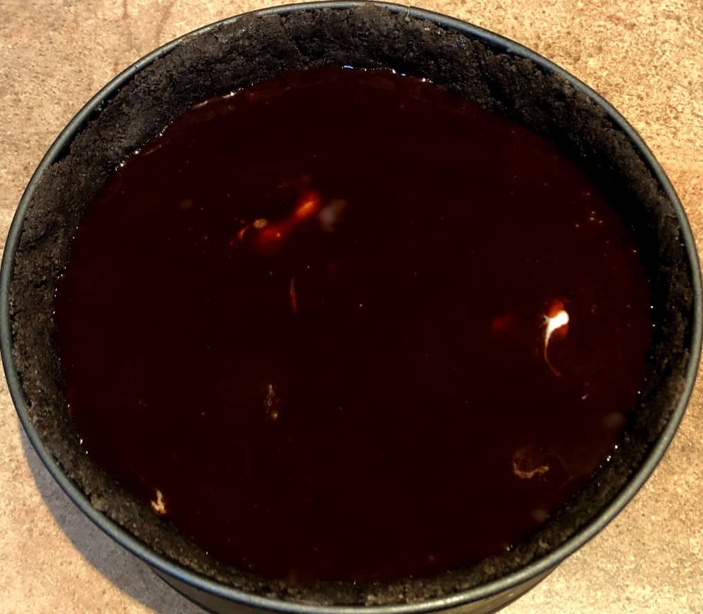 chocolate syrup on top of ice cream pie.