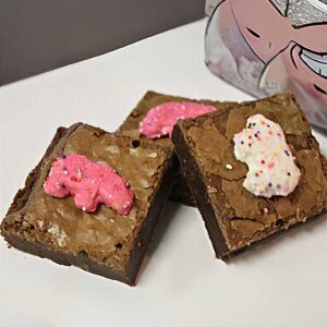 Circus Animal Brownies are fudgy brownies with shiny tops and Circus Animals on top.