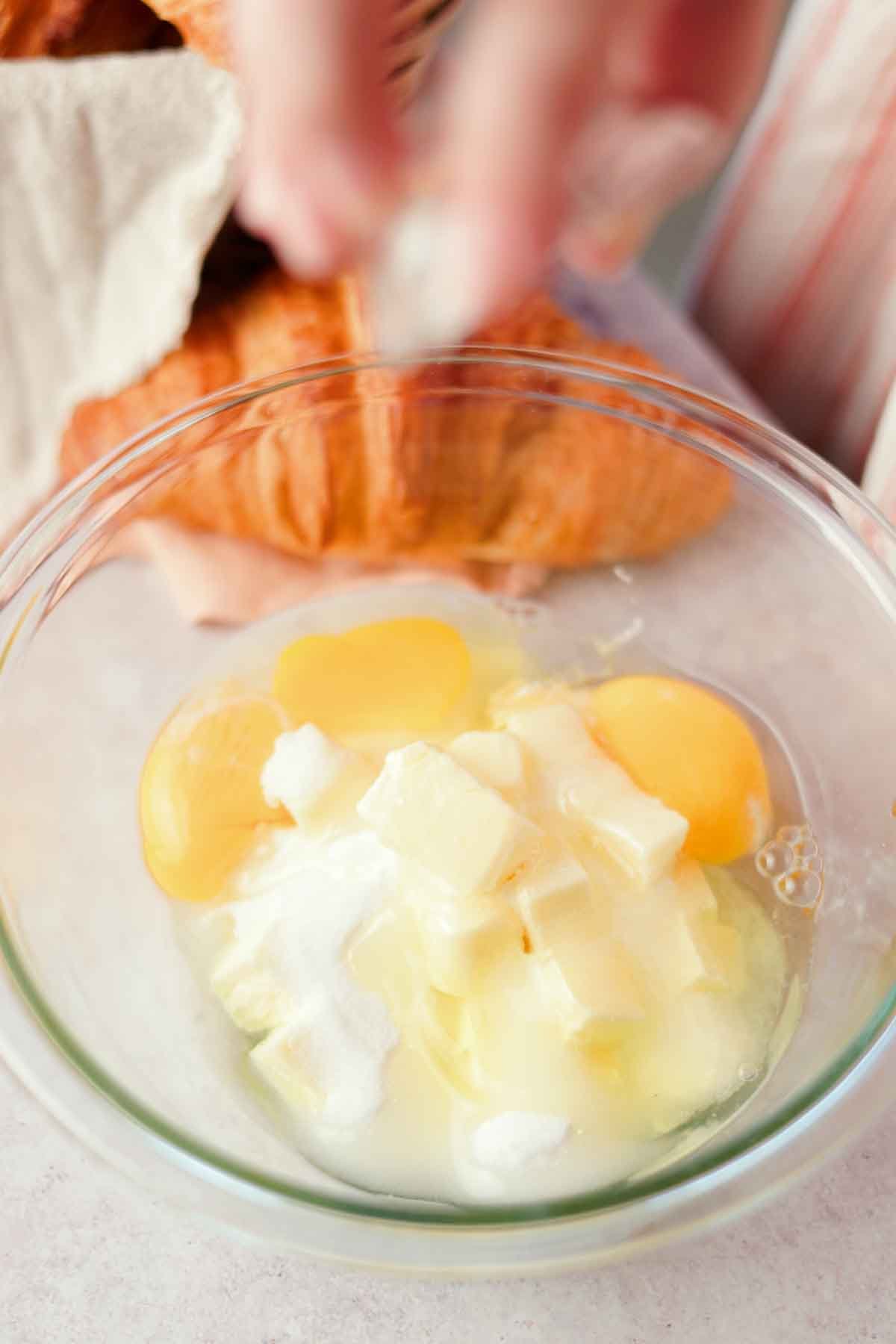 combining sugar, butter, and eggs