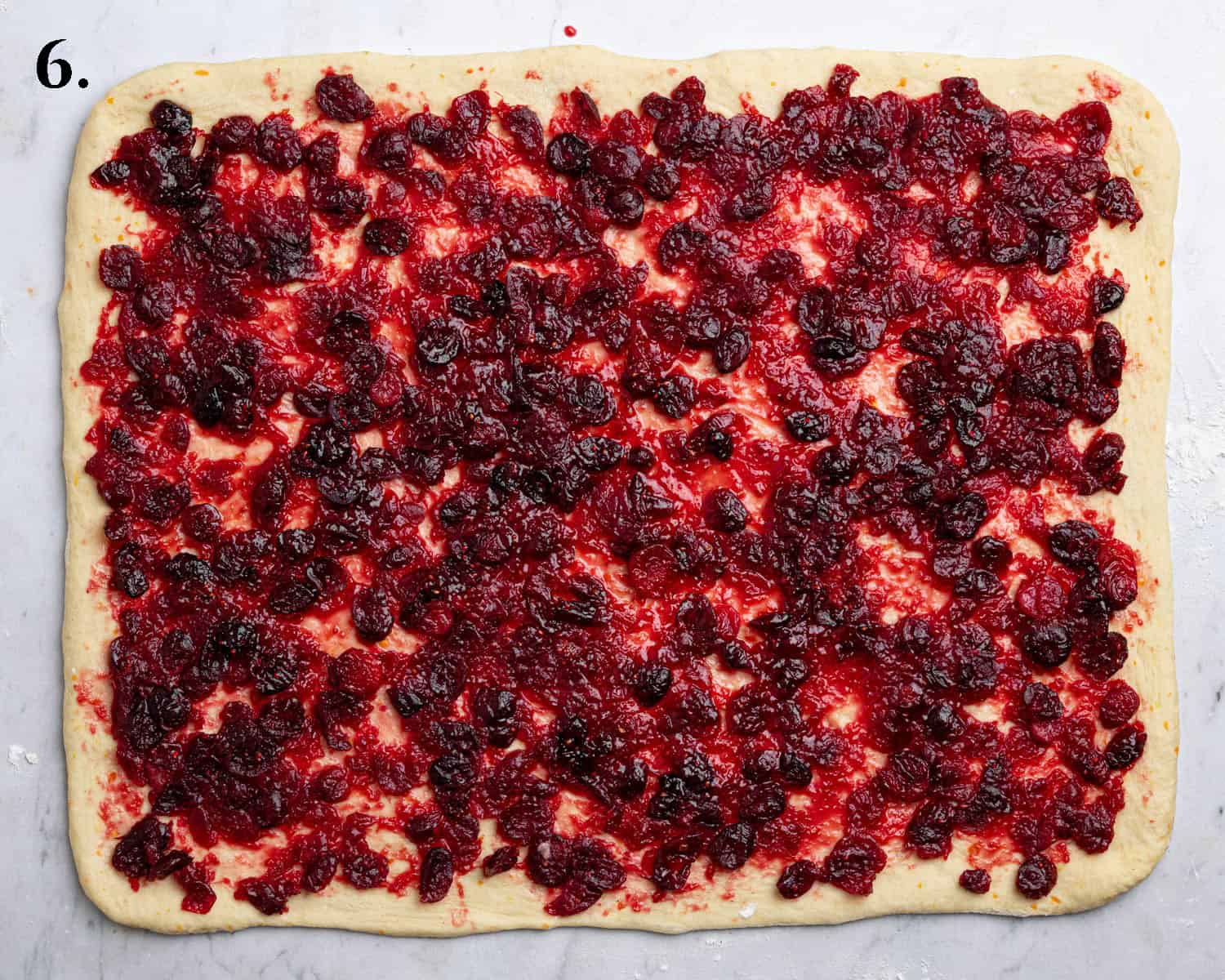 Step 6, the rolled out dough with the filling.