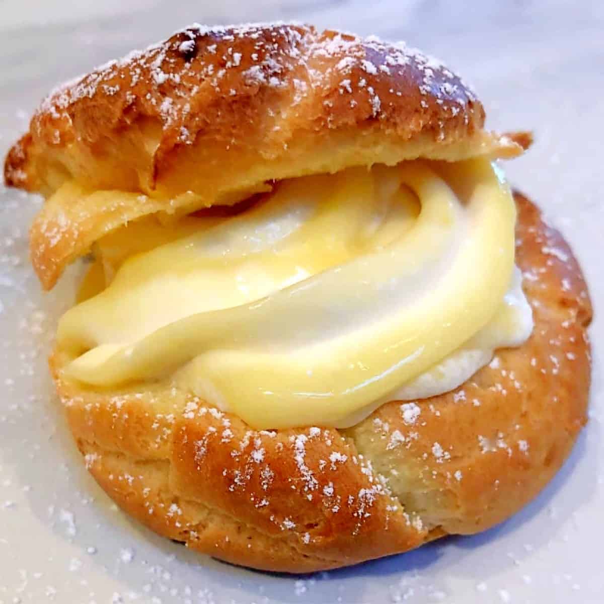 cream puff with lemon curd and cream swirled inside