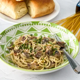 finished creamy bacon spaghetti carbonara with mushrooms