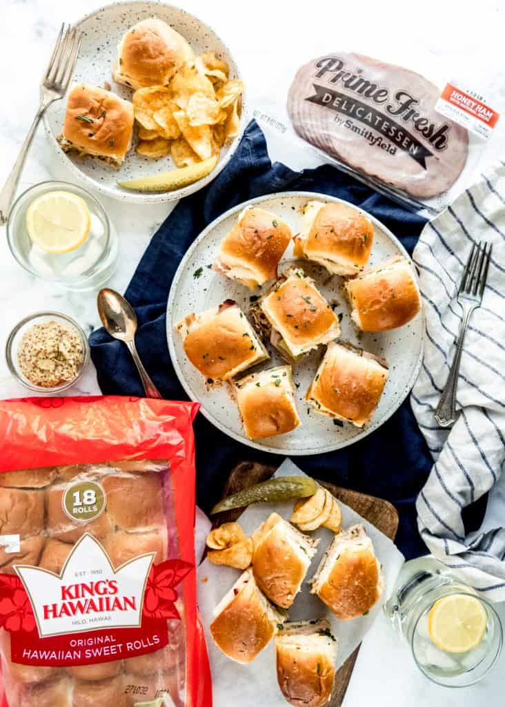 Cuban sliders on plates and platter with napkins