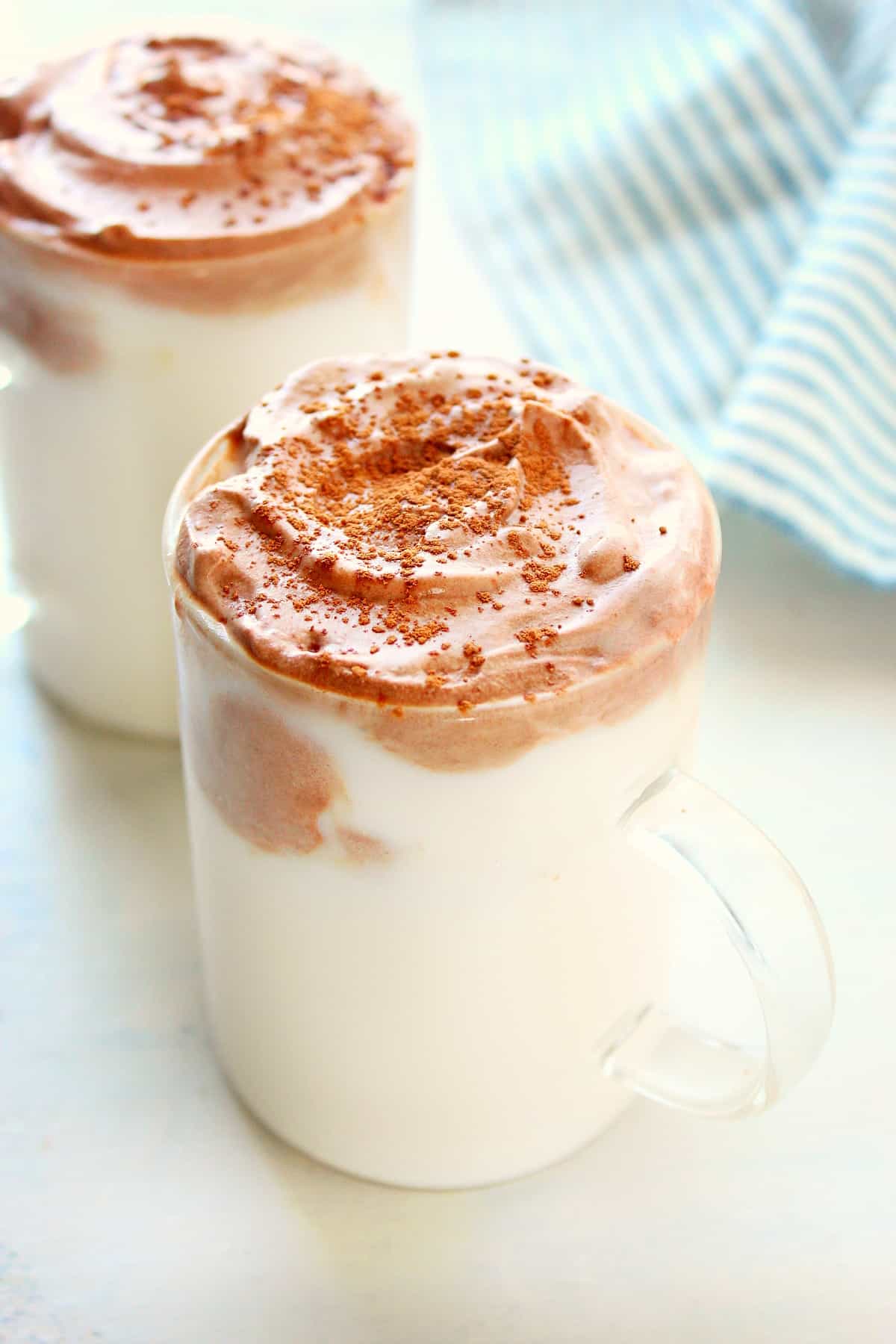 Whipped Hot Chocolate Whipped hot chocolate in two glasses.