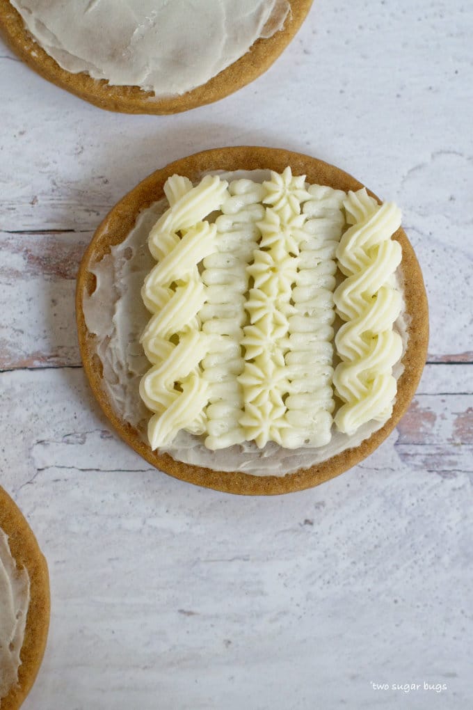 Fifth row of cable knit sweater piping added using Wilton 18