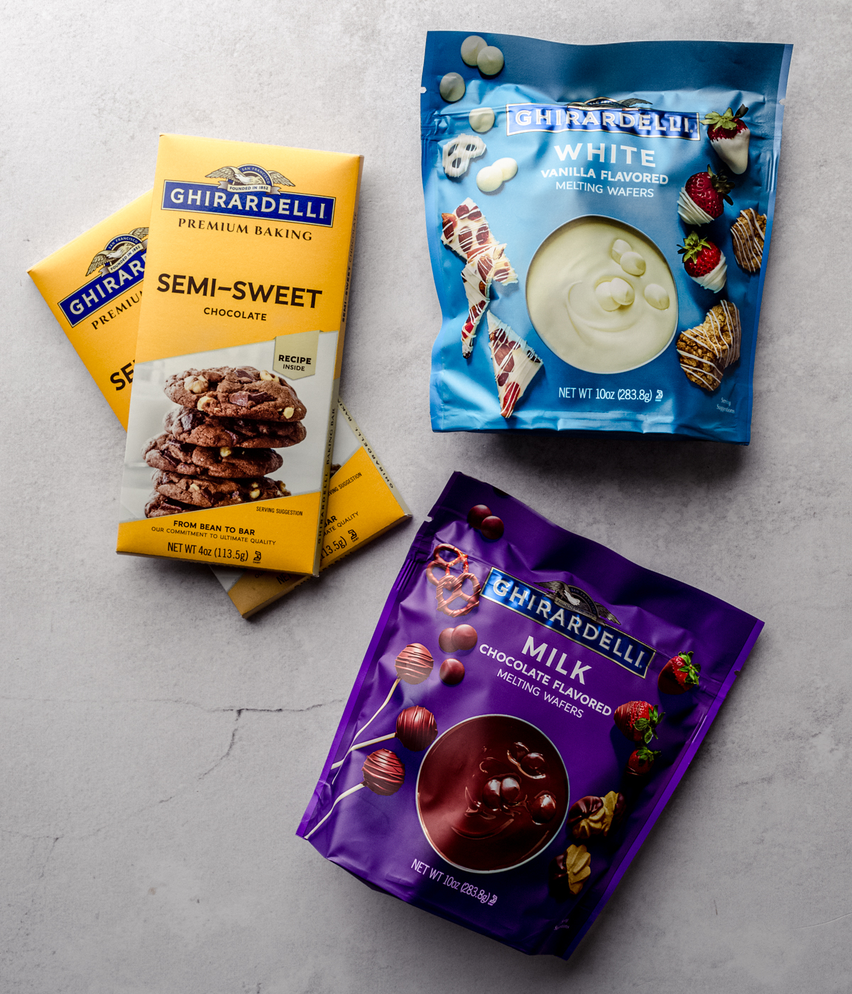 Aerial photo of bags and blocks of chocolate coating for buttercream Easter candies.