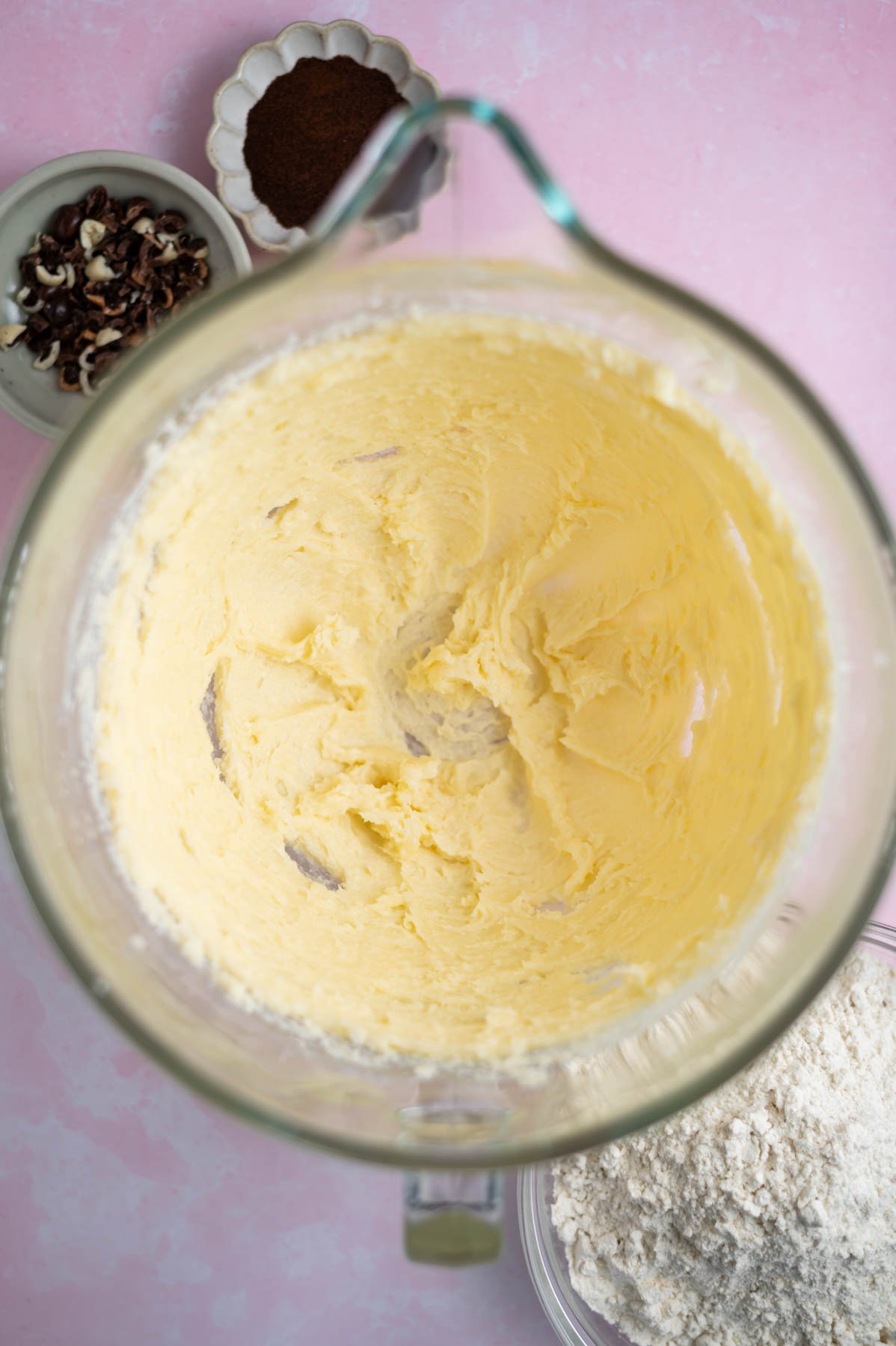 butter and sugars creamed together in a mixing bowl