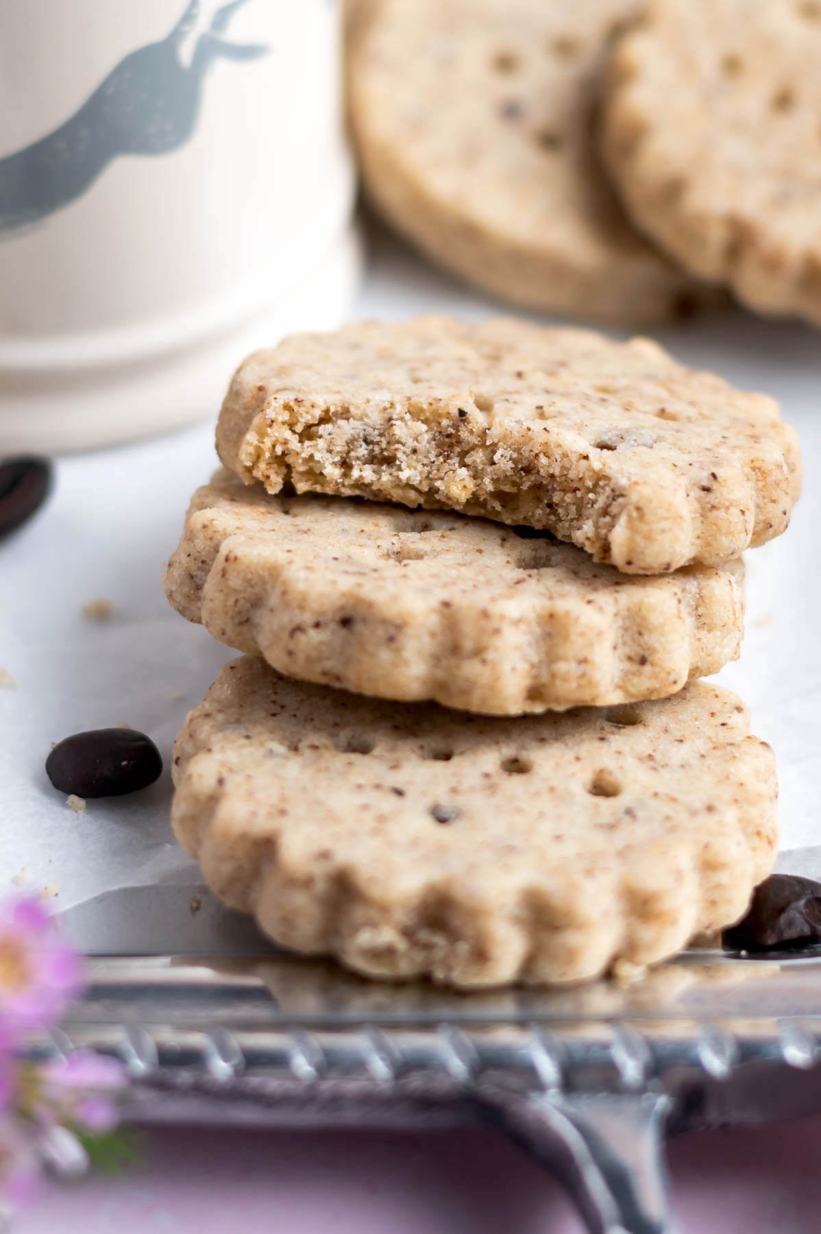 espresso shortbread with one cookie missing a bite