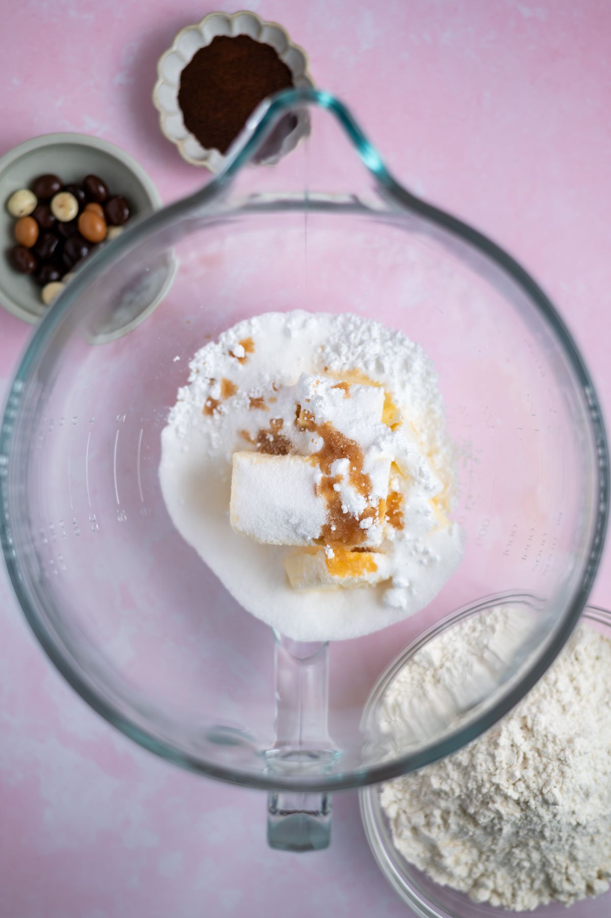 butter, granulated and confectioners' sugar, vanilla and salt in a mixing bowl