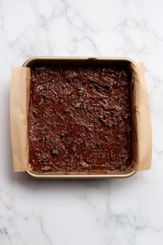 brownie batter in baking dish before baking