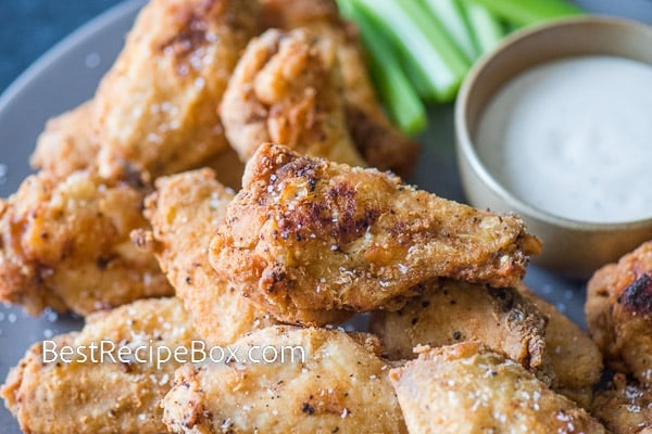 Cooked chicken wing seasoned with salt and pepper