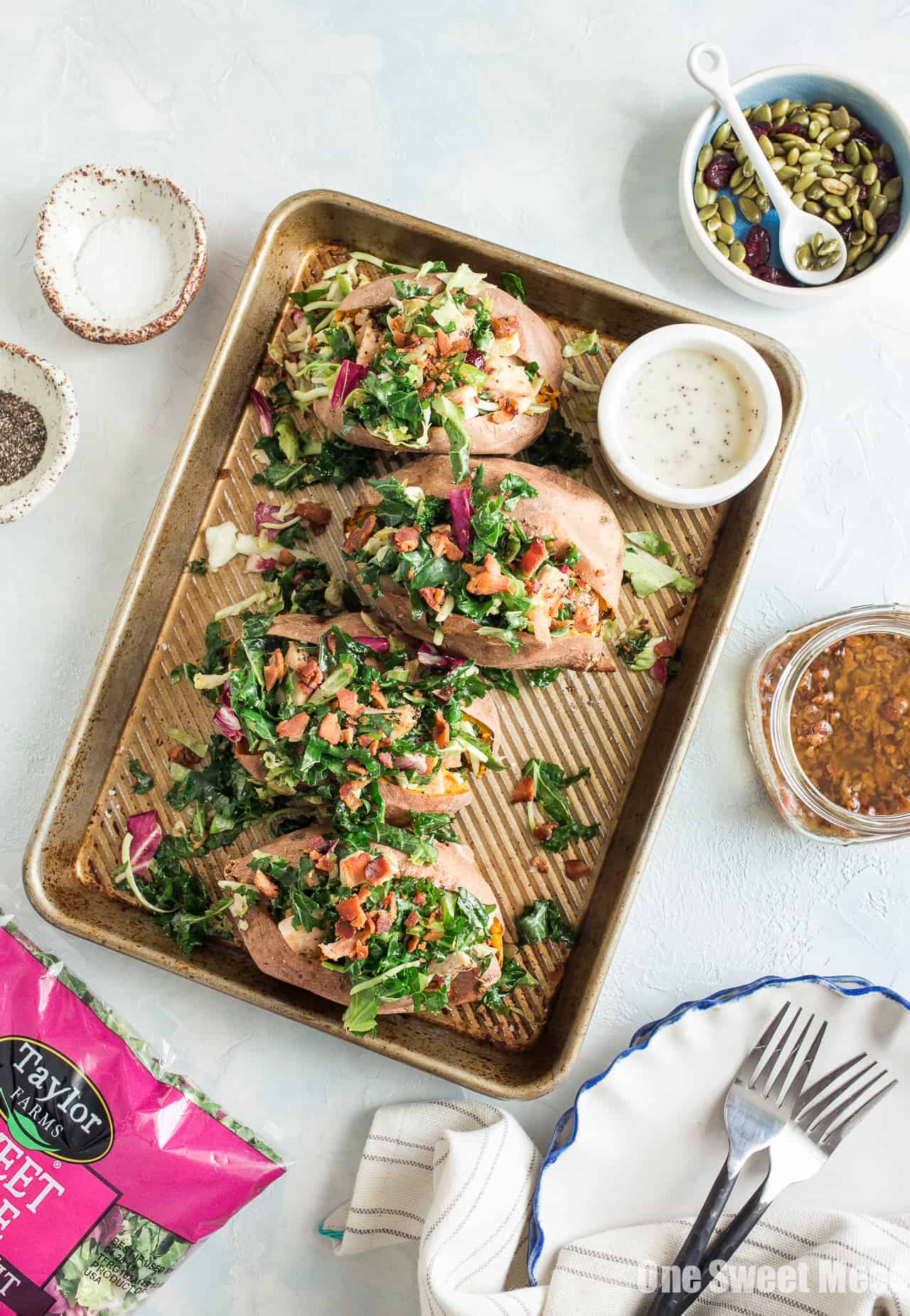 Grilled Chicken & Sweet Kale Salad Stuffed Sweet Potatoes: Loaded with grilled poppy seed dressing glazed chicken and topped with sweet kale salad tossed in warm bacon vinaigrette. Hearty, healthy and gluten-free.