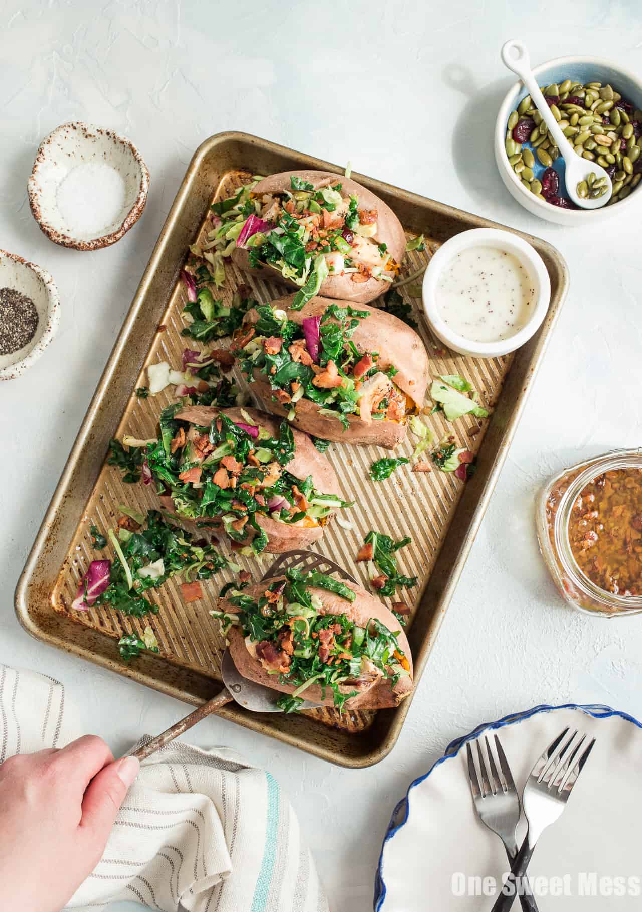 Grilled Chicken & Sweet Kale Salad Stuffed Sweet Potatoes: Loaded with grilled poppy seed dressing glazed chicken and topped with sweet kale salad tossed in warm bacon vinaigrette. Hearty, healthy and gluten-free.
