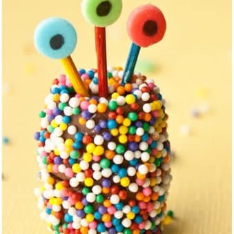 Easy Edible Halloween Chocolate Monsters on Yellow Background