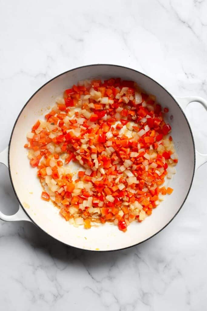 sauting onions, bell pepper, and carrots