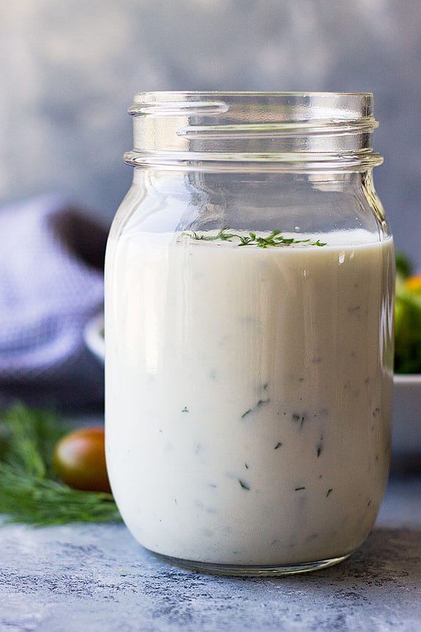 This Homemade Buttermilk Ranch Dressing is an easy recipe to replace those store bought bottles! It's fresh, creamy and perfect for any salad!