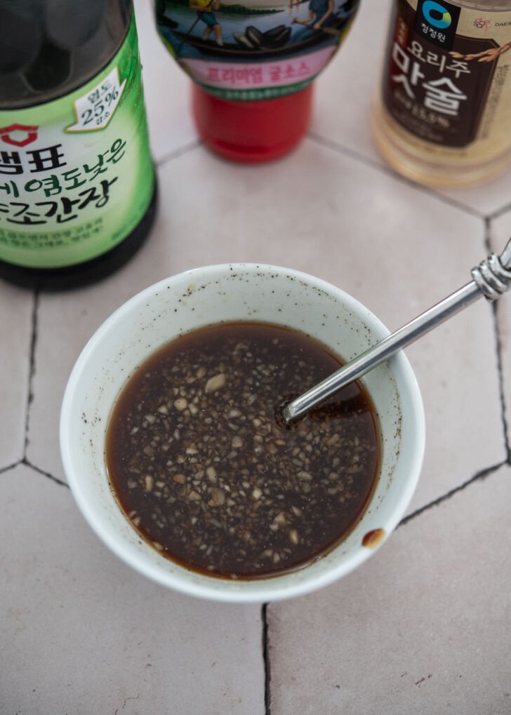 Honey garlic glaze ingredients combined in a mixing bowl before cooking
