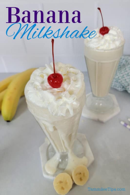 Banana Milkshake text over two shake glasses with overflowing banana milkshakes next to bananas and a cloth napkin