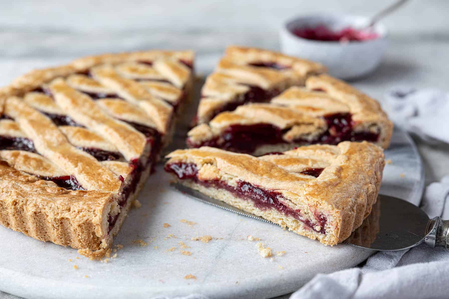 Close up of a slice of crostata.