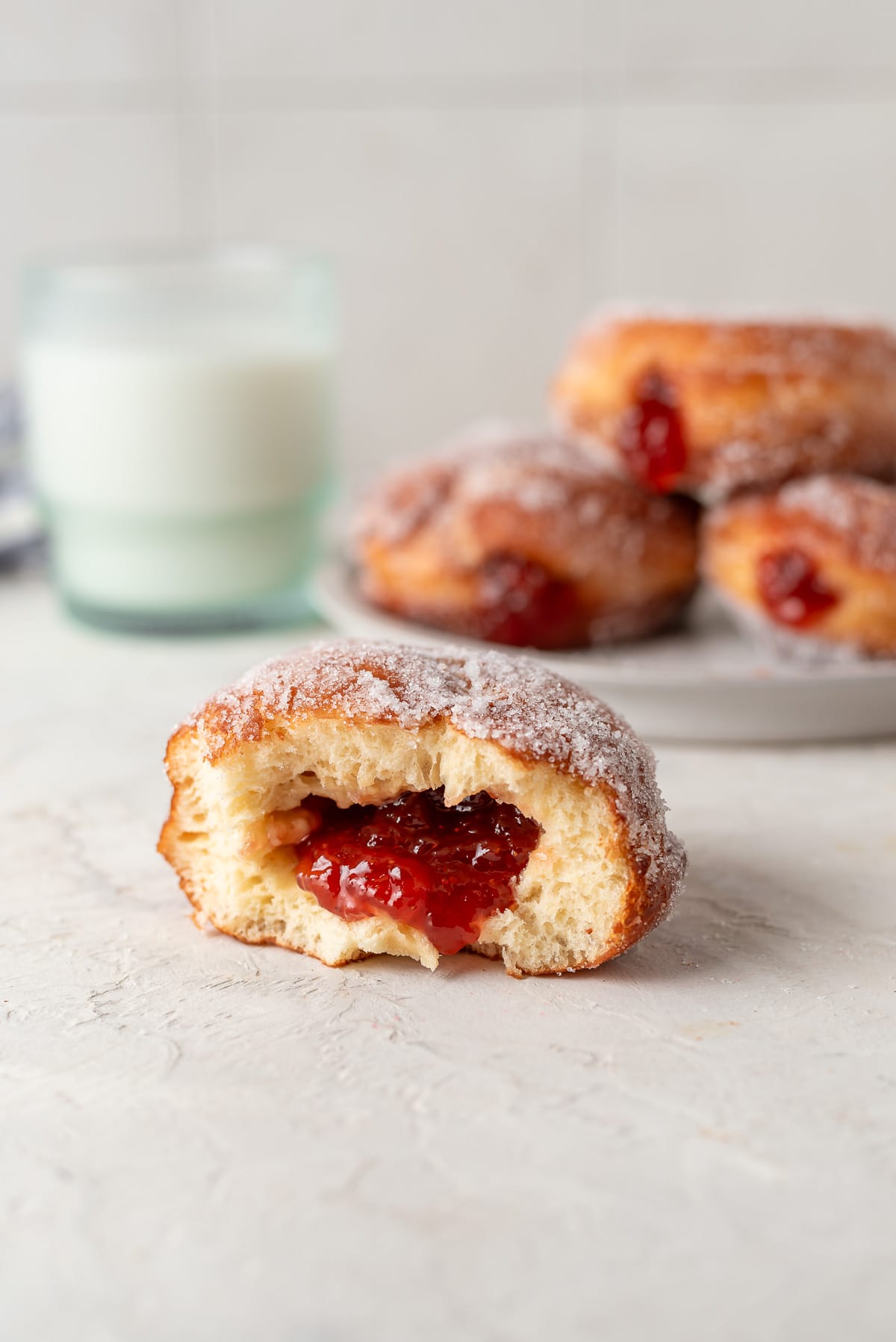 donut cut in half showing jelly inside