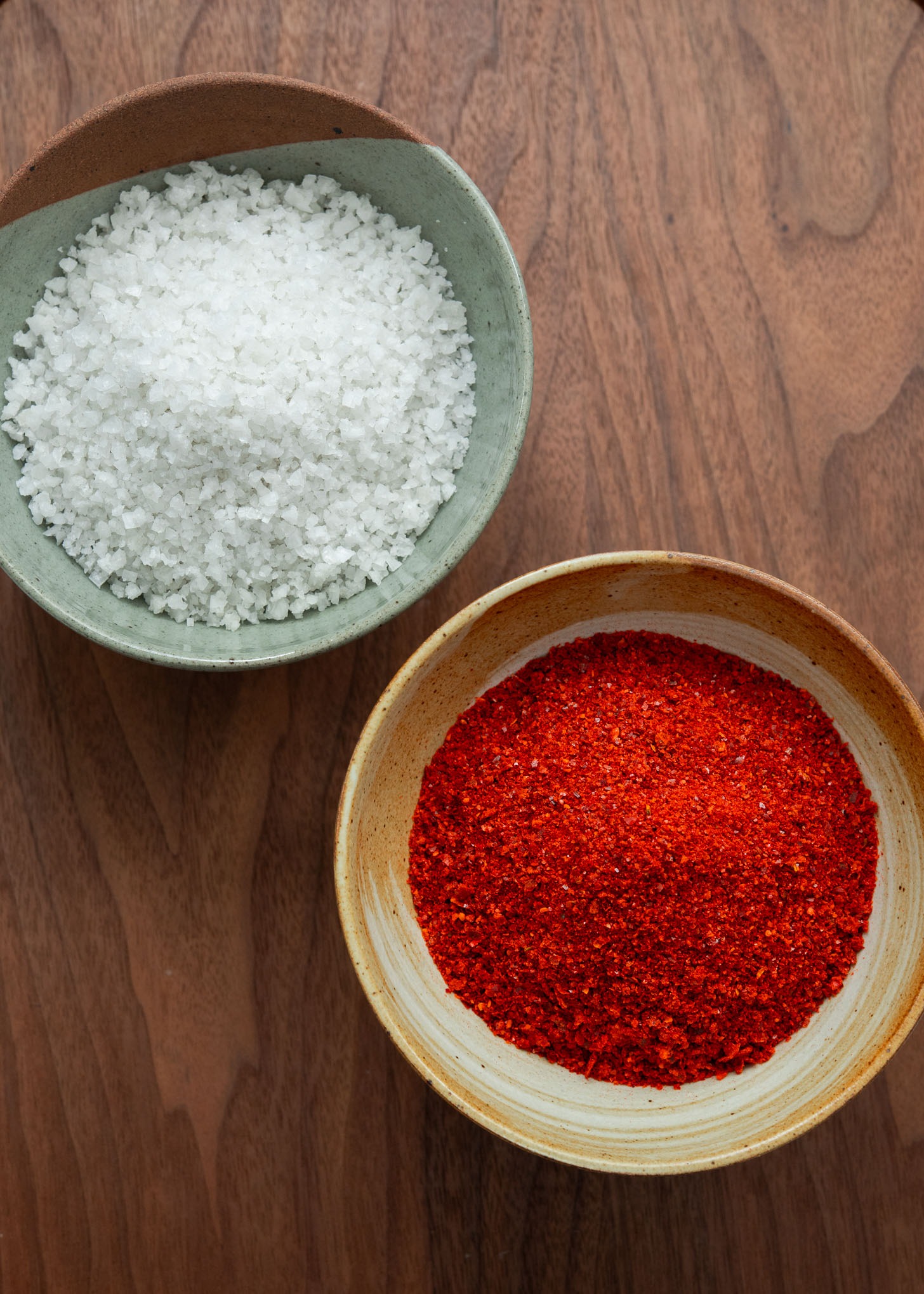 Korean coarse sea salt and chili flakes (gochugaru).