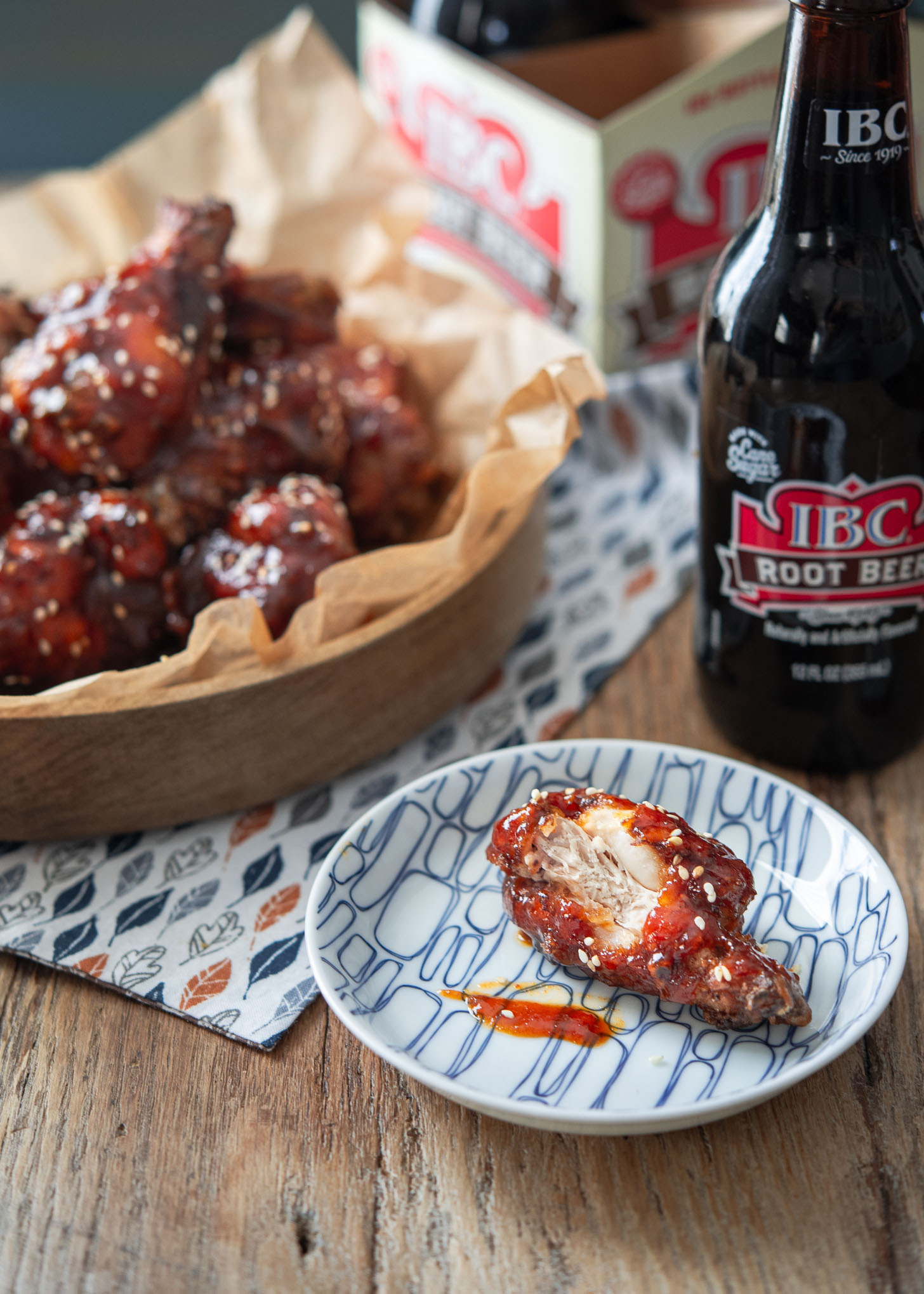 A piece of Korean fried chicken wing on a plate.