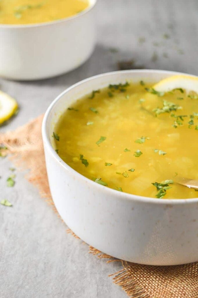 Two soup bowls on a grey background