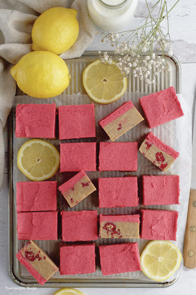 cut squares on a baking pan with lemons