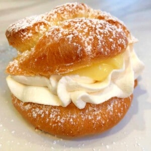 meyer lemon cream puff with powedered sugar on top