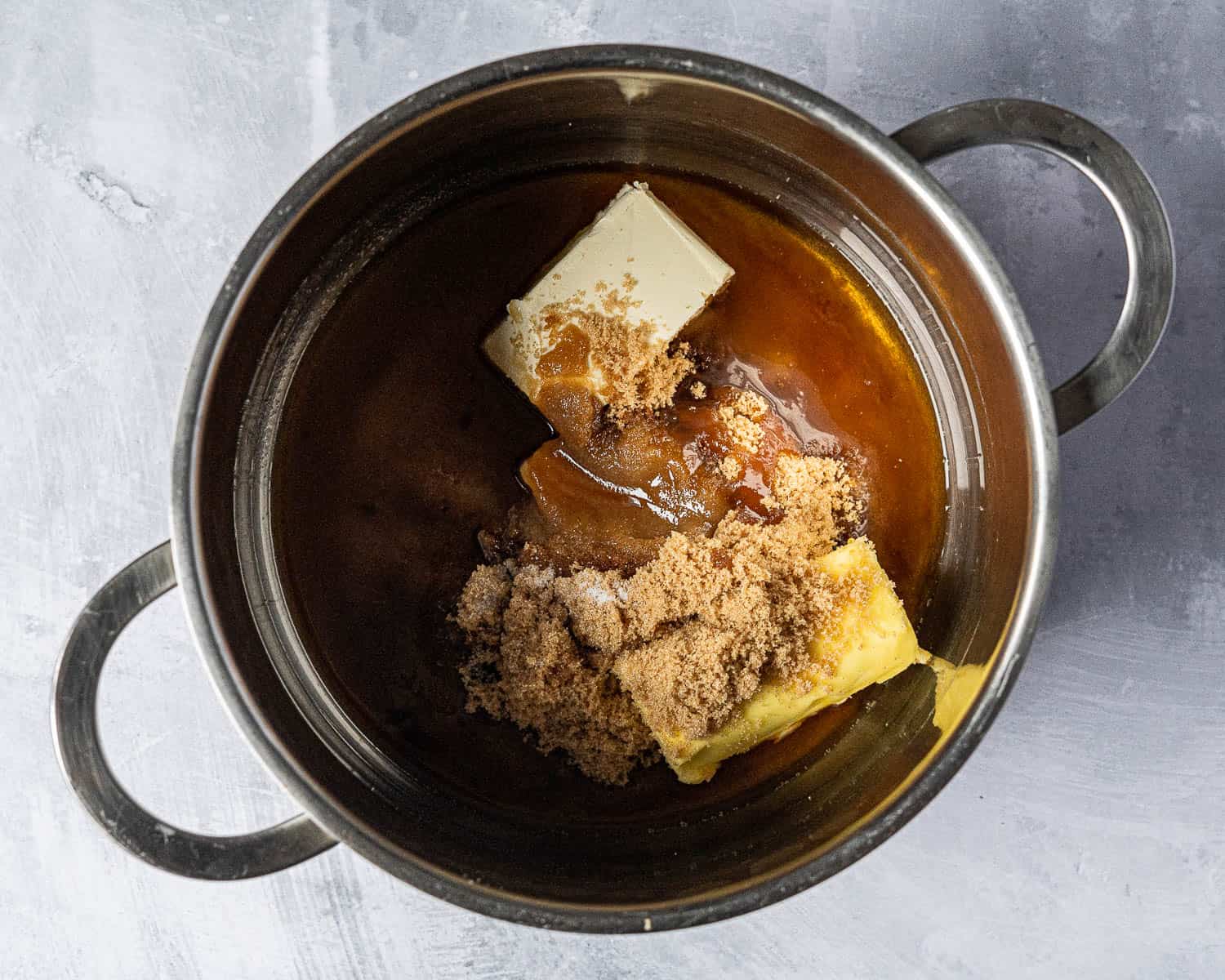 Step 5, the butter, sugar and rum in a pan.