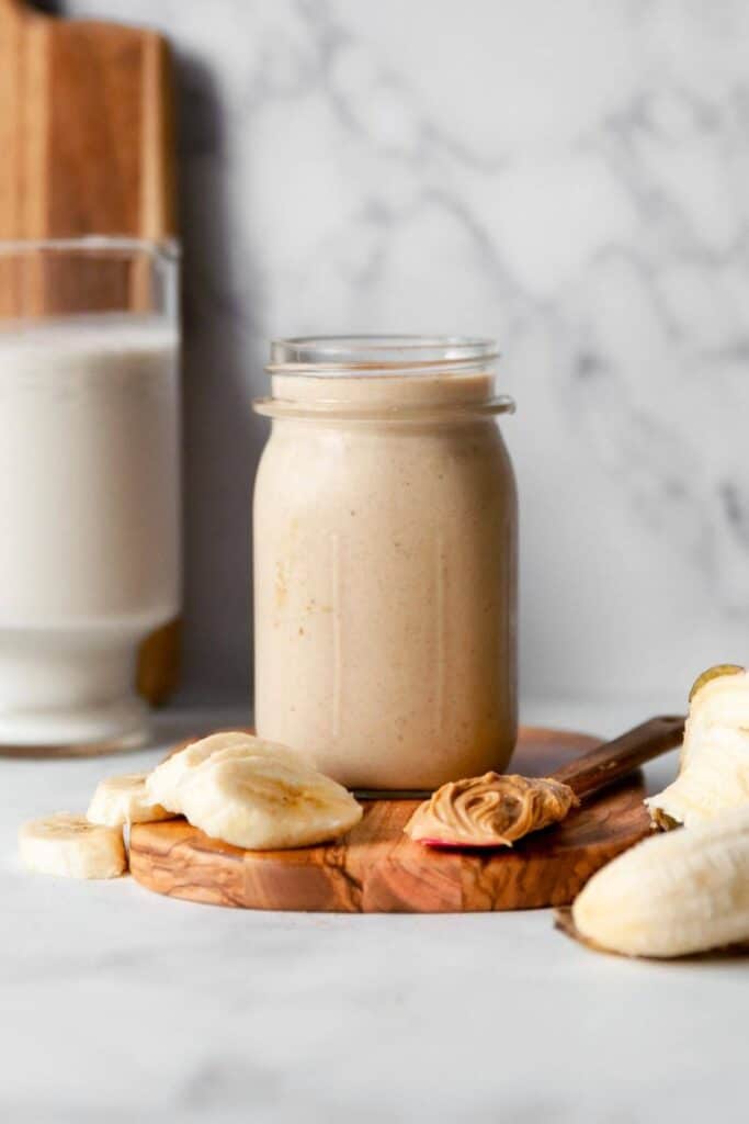 thick snickerdoodle oat milk smoothie in a mason jar