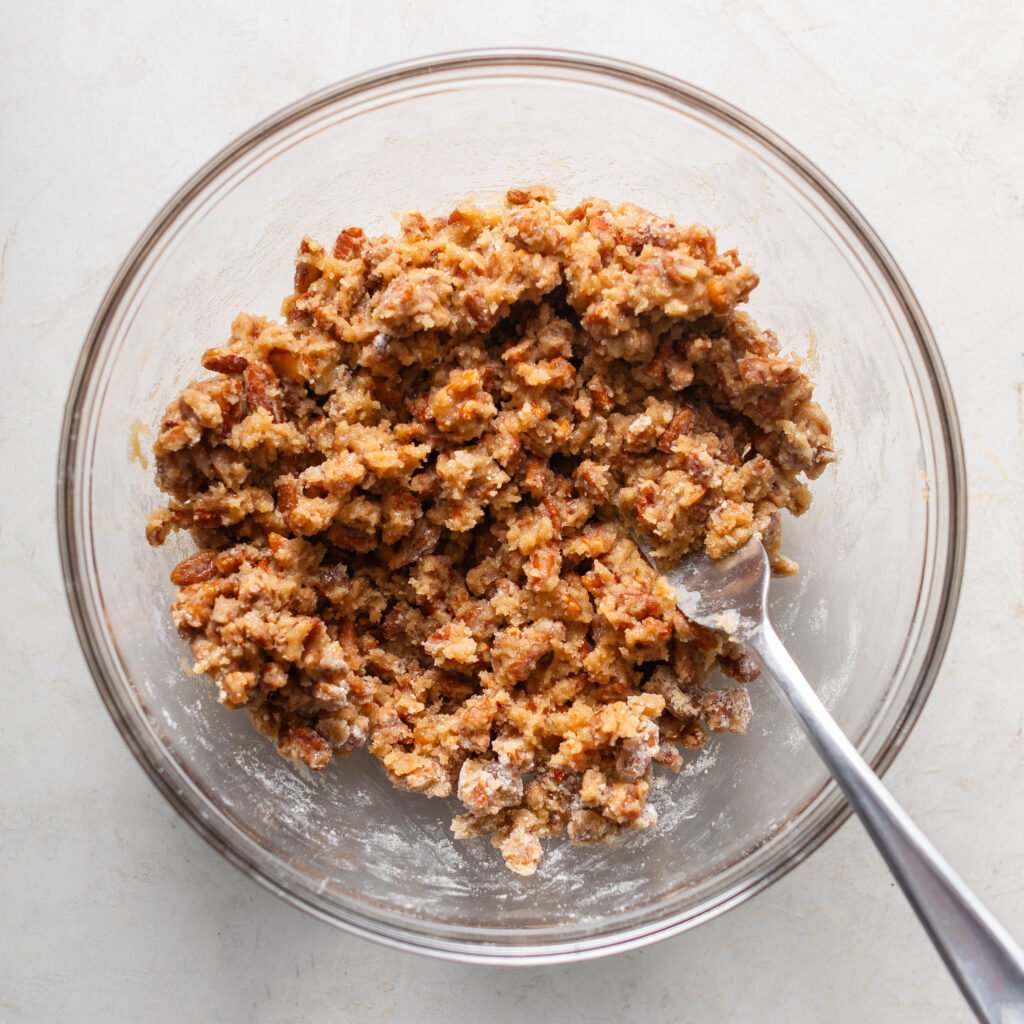 streusel topping in glass mixing bowl with fork