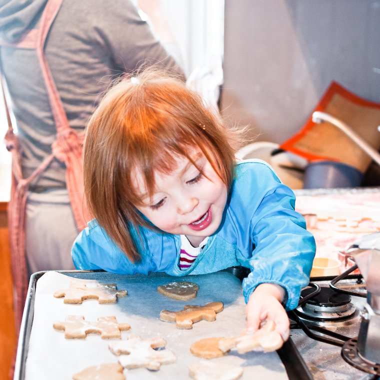 Olivia making cinnamon cookies