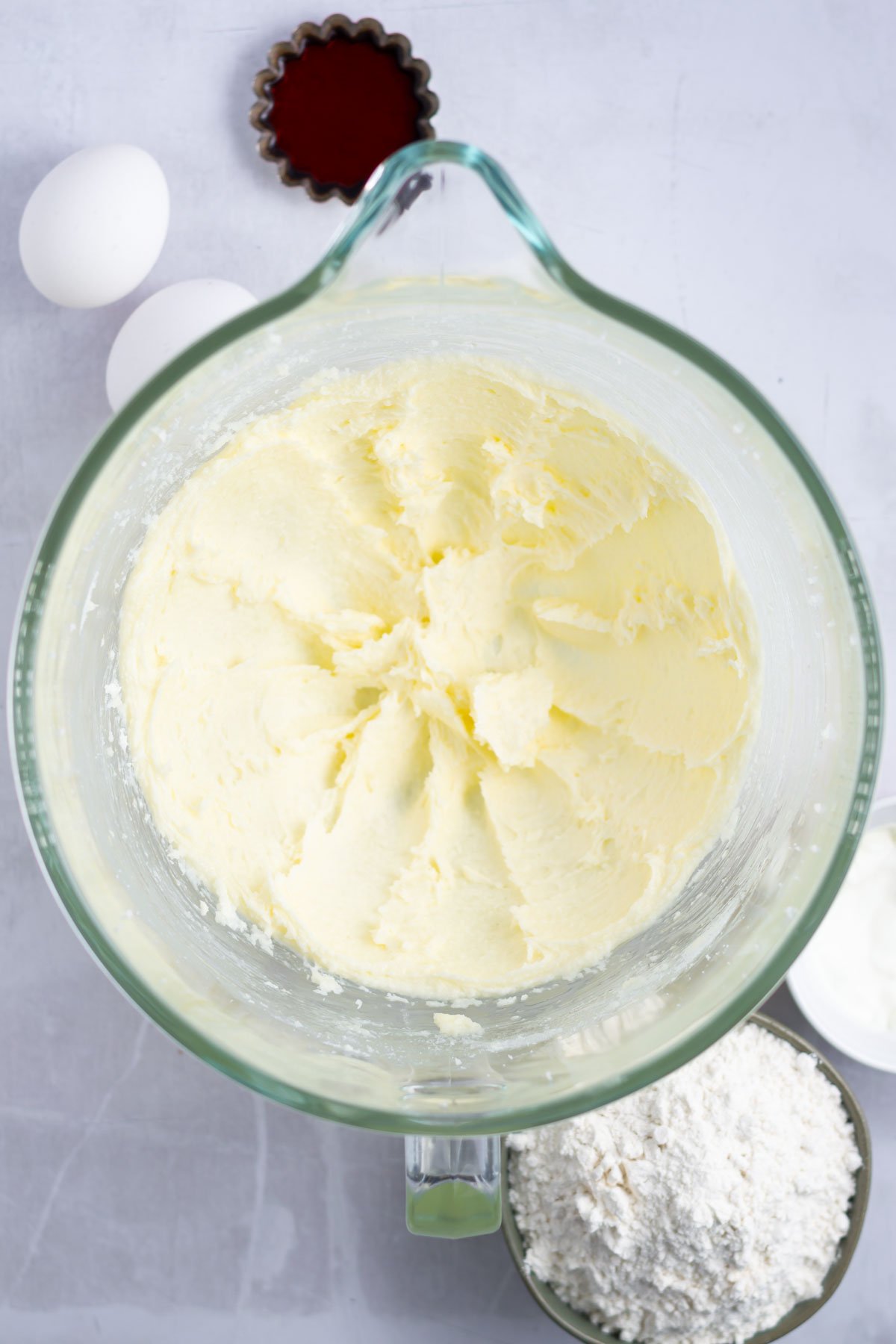sugar and butter creamed together in a mixing bowl
