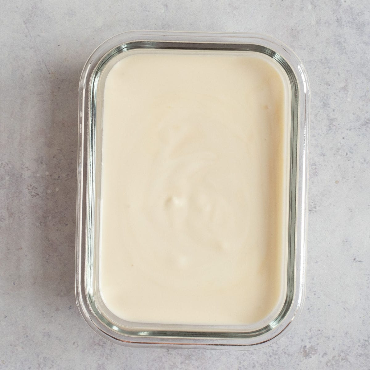 Weetabix topped with yogurt.