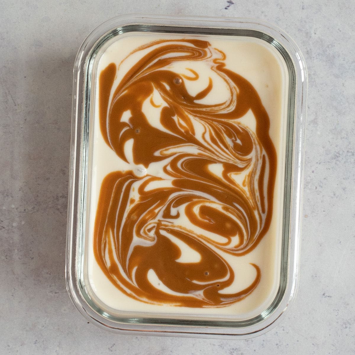 Biscoff spread swirled through yogurt topping.