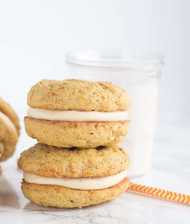 Peanut Butter Carrot Cake Whoopie Pies - peanut butter carrot cake cookies filled with a peanut butter cream cheese frosting. 