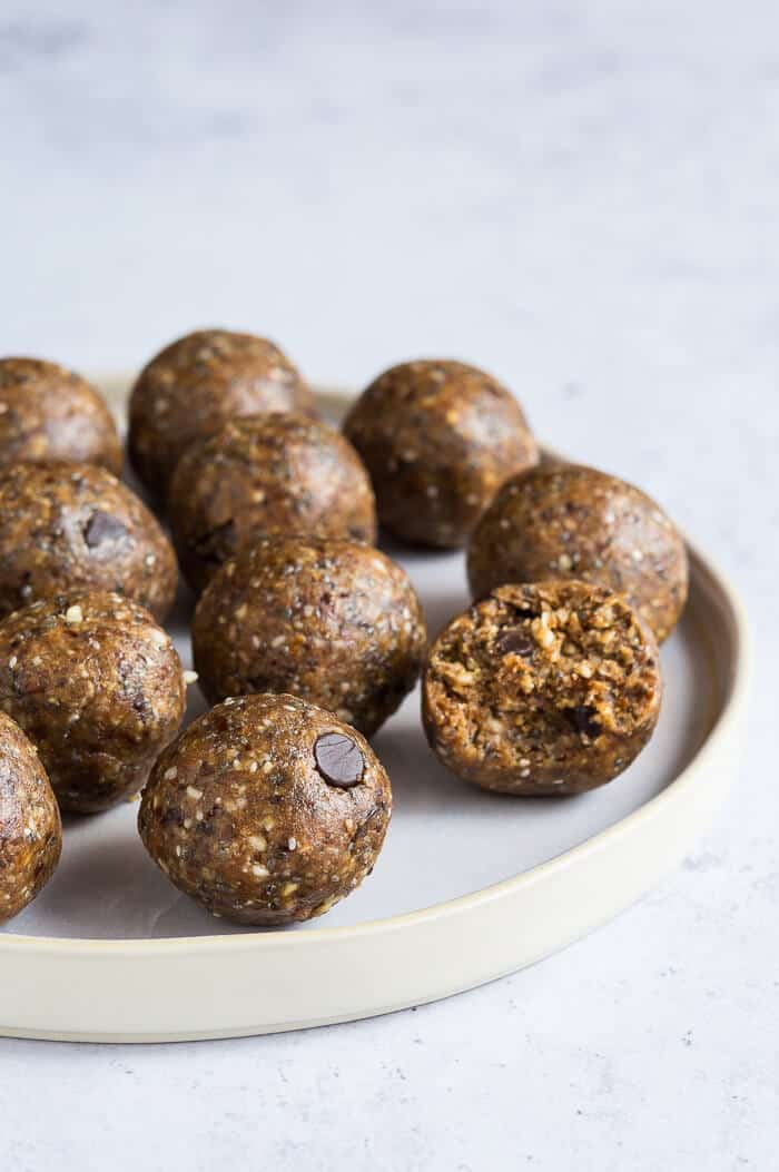 Side shot of vegan peanut butter chocolate chip cookie dough energy balls.