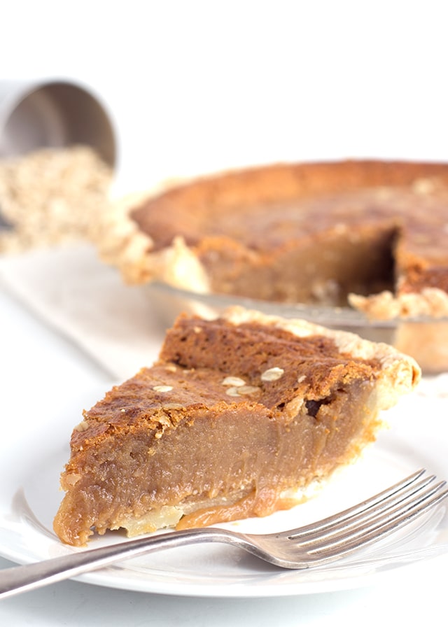 Peanut Butter Fudge Pie - Gooey peanut butter pie that's incredibly decadent and tastes like a mouthful of chewy fudge. This pie is similar to a pecan pie except with peanut butter. You'll want to make this, You can thank me later