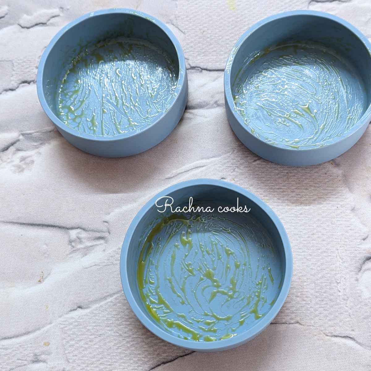 3 silicone egg molds brushed with oil.