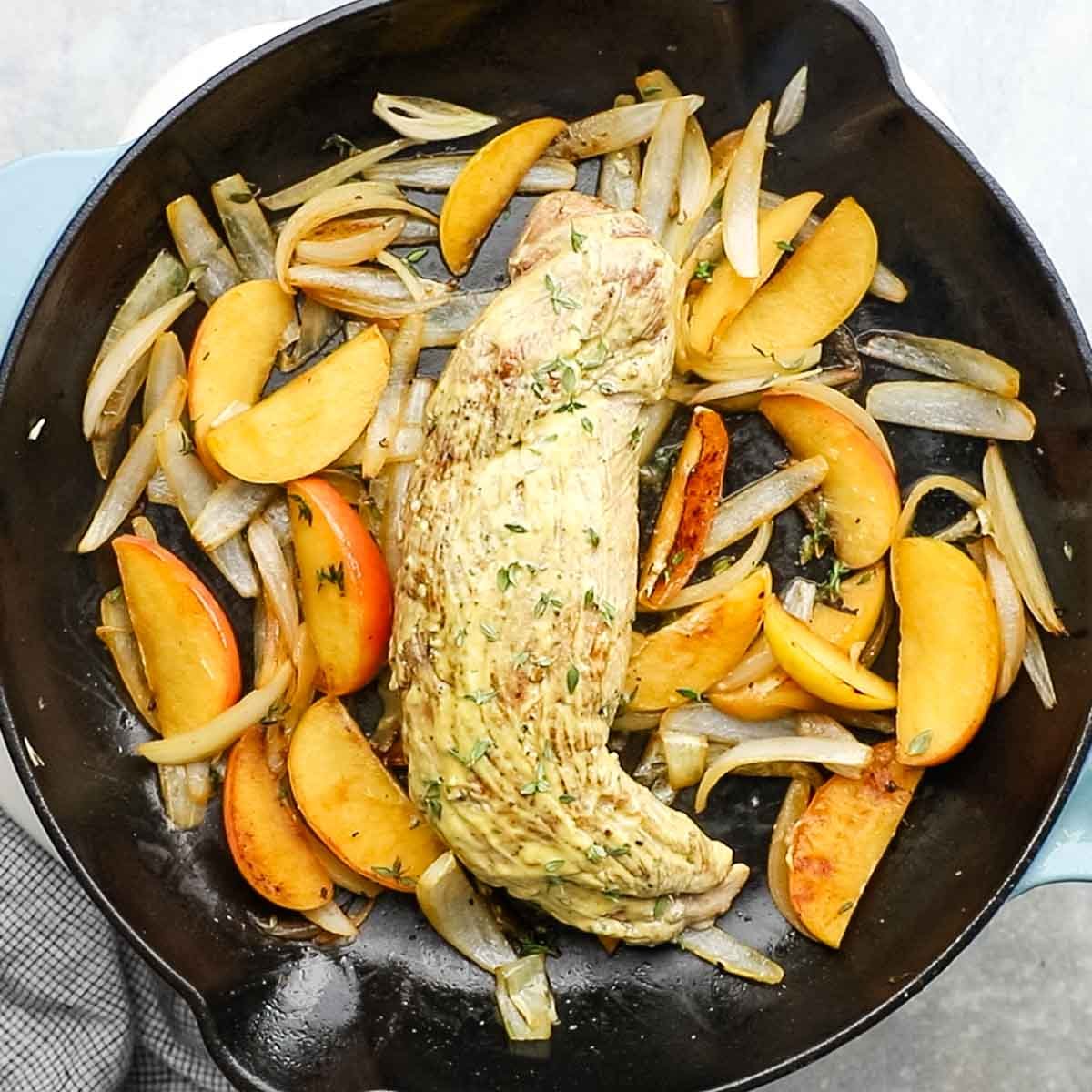 pork added back to the pan with apples and onions