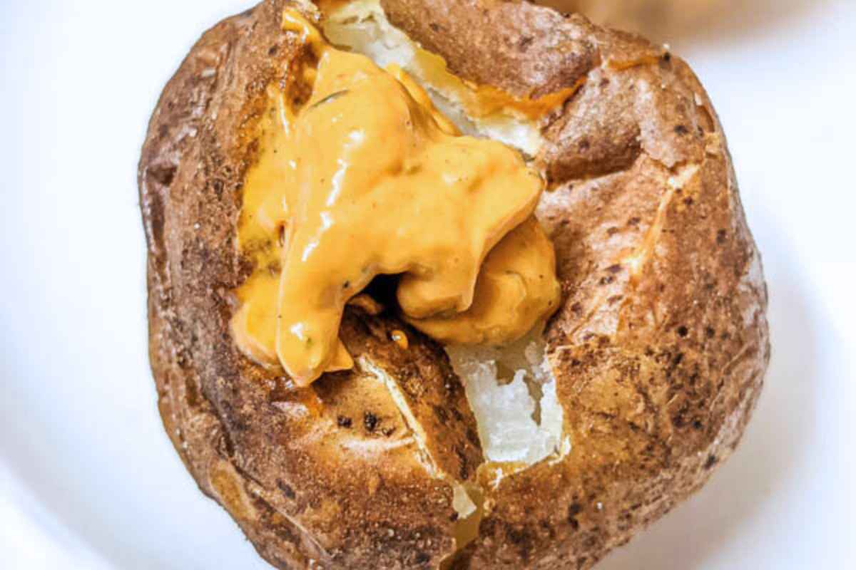 Delicious baked potato on a plate
