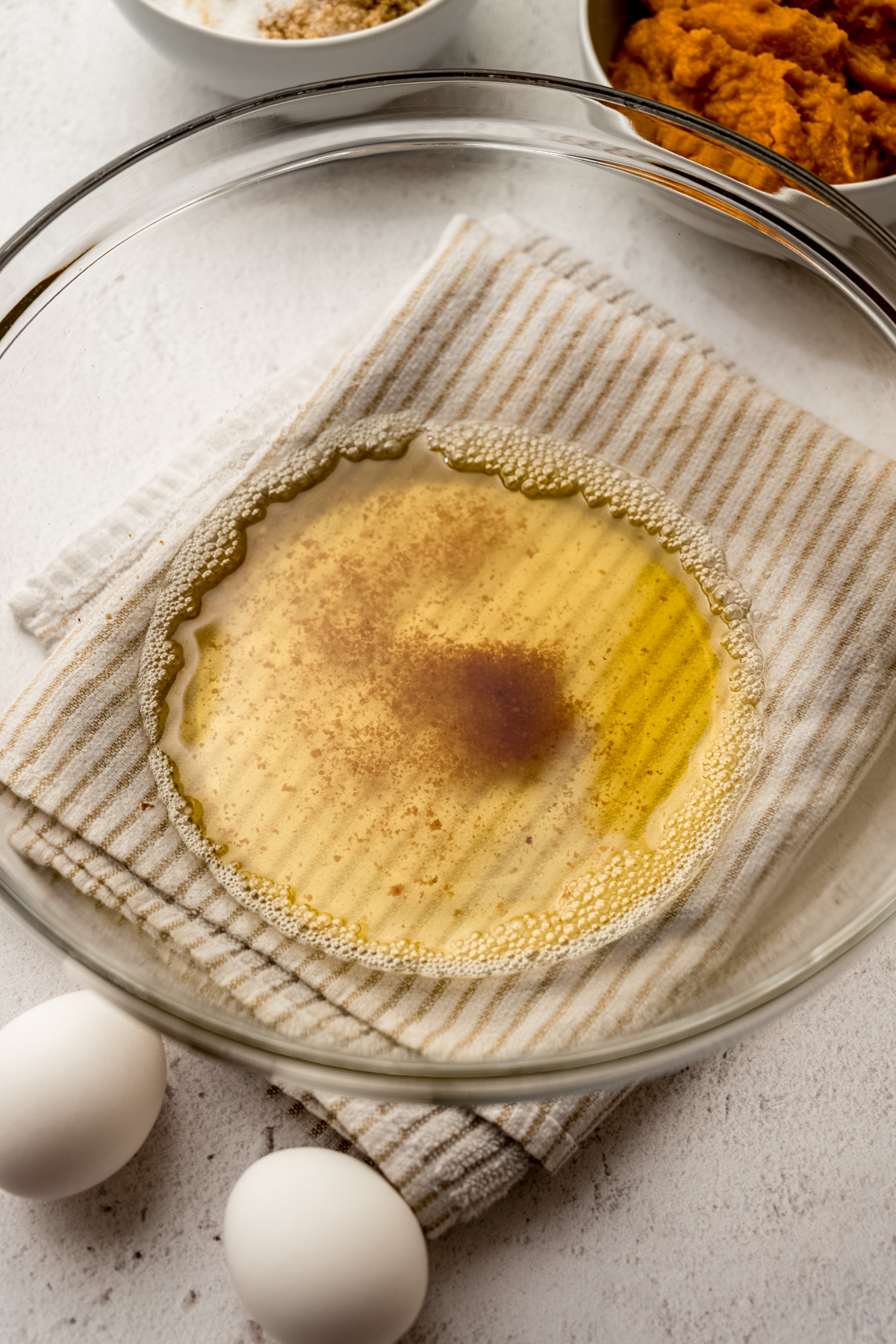 Brown butter in a glass bowl.