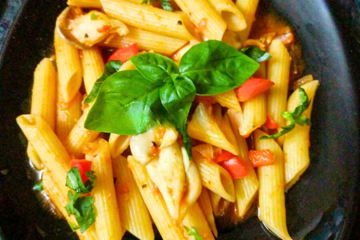Delicious red sauce pasta served on a plate