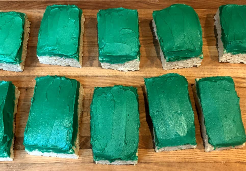 rice krispie rectangles with green frosting.