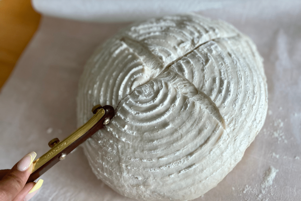 scoring dutch oven sourdough bread